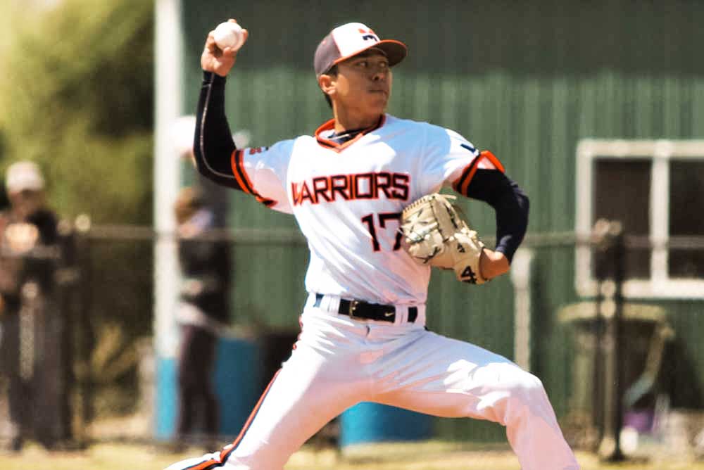 Midland University Student Playing Baseball