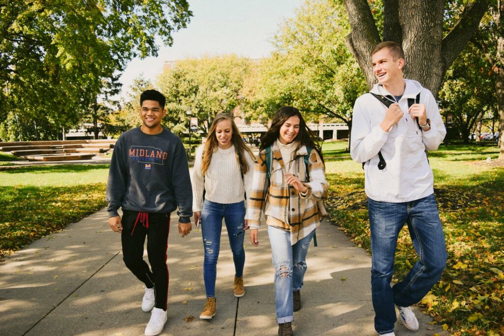 Midland University Students walking on campus on a fall day