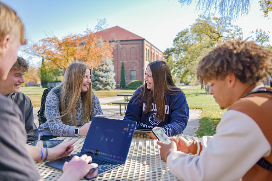 Students Sitting Outdoors